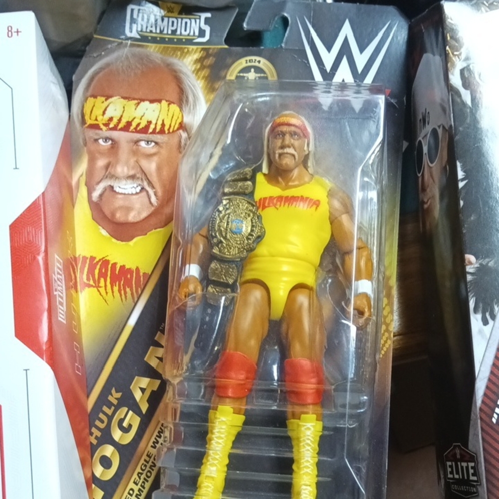 WWE Hulk Hogan Figure in Yellow Gear with Belt